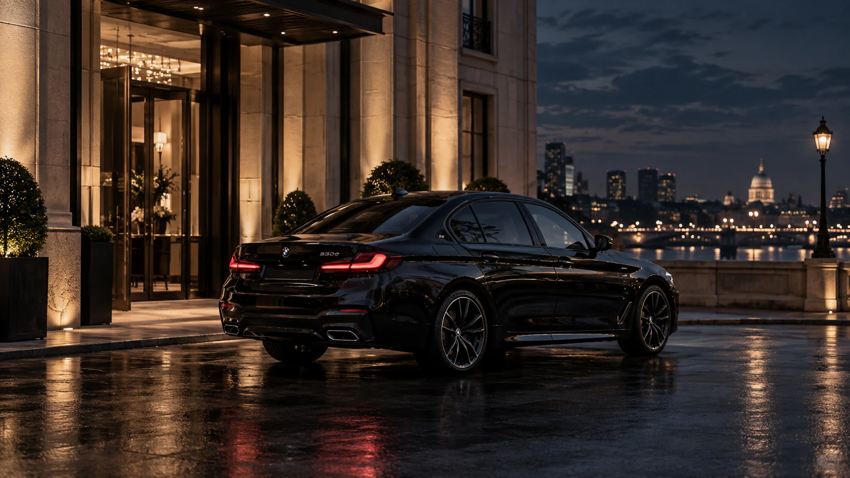 Luxury black chauffeur vehicle outside a premium hotel